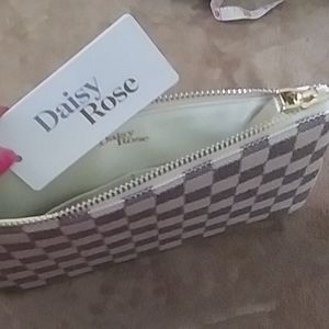 Daisy Rose white checkered wristlet wallet.
